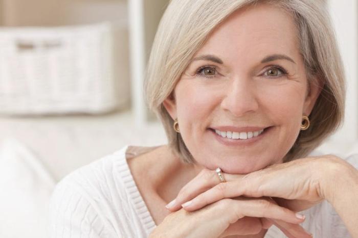 Mature lady with perfect teeth